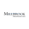 Millbrook Real Estate Company logo